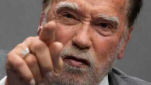 Quote of the day by Arnold Schwarzenegger: "Just remember, you can't climb the ladder of success with…" - a powerful lesson on ambition, hard work and why success demands action