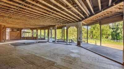 In 1994, Hollywood Video’s founder bought 32 Oregon acres for $1.25 million and began a 52,000-sq-ft mansion; nearly 30 years and 3 owners later, it is still unfinished and asking $4.7 million