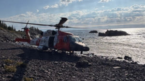A 70-year-old hiker disappeared on Michigan's remote Isle Royale for a week; backpackers helped find him injured and hypothermic before a Coast Guard helicopter hoisted him out