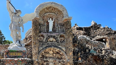 An Iowa priest vowed to build a shrine if he survived pneumonia; after recovering, he spent 42 years using over 100 train carloads of stone to create it