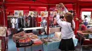 Pennsylvania's youth business fair grew from 60 booths in 2022 to 100 in 2026; kids ages 5 to 16 handled their own products, pricing and sales with no adults behind the tables