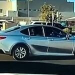 A Las Vegas crossing guard steps in front of speeding car as it bears down on mother, 2 children; came within 10 feet