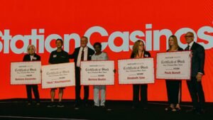 Las Vegas company surprises nearly 10,000 workers with more than $70 million in stock; each gets $1,000 for every year they have worked there