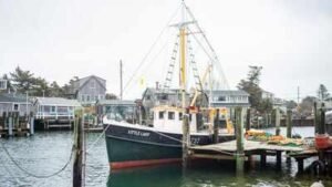 In 1929, a fisherman built a wooden boat beside the home where he was raising 13 children; nearly a century later, $1.5 million is being raised to restore it