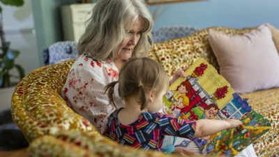 A 67-year-old Idaho teacher retired and drove across the US to Delaware after her daughter's daycare bill matched the mortgage; she now provides about 30 hours of childcare every week for her granddaughter