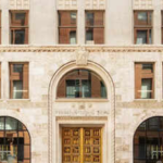 Denver's historic bank building was bought for $17.6 million and got a $22.4 million renovation; after WeWork left, the 107,630-sq-ft property is now 100% vacant