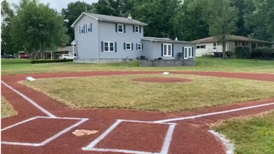 An Ohio boy asked his dad for a baseball field in their backyard; two years and about $30,000 later, the family had its own diamond with infield clay, regulation bases, a raised mound and hand-painted foul lines