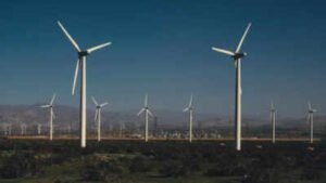 Iowa livestock farmer Dave Johnson hosts four wind turbines that bring in about $30,000 a year, calling the steady lease income the 401(k) he never had while he continues raising cattle and hogs