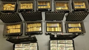 Federal executive with top-secret clearance created a fake classified program and diverted $145 million into luxury property and gold; after FBI found 298 gold bars, he pleaded guilty to a $193.6 million fraud