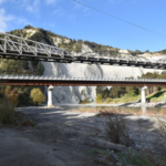 New Zealand replaced this 1904 bridge with a modern crossing after 112 years; locals saved the historic structure, now the country’s only surviving steel cantilever road bridge