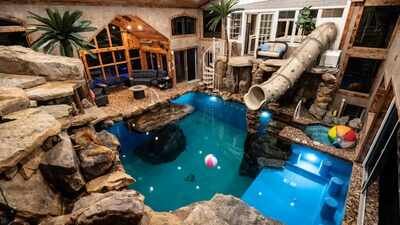 An Indiana man sketched a backyard pool on a napkin after a 1.5-year installation wait; two years later it became a 60,000-gallon private water park now renting for $140 an hour